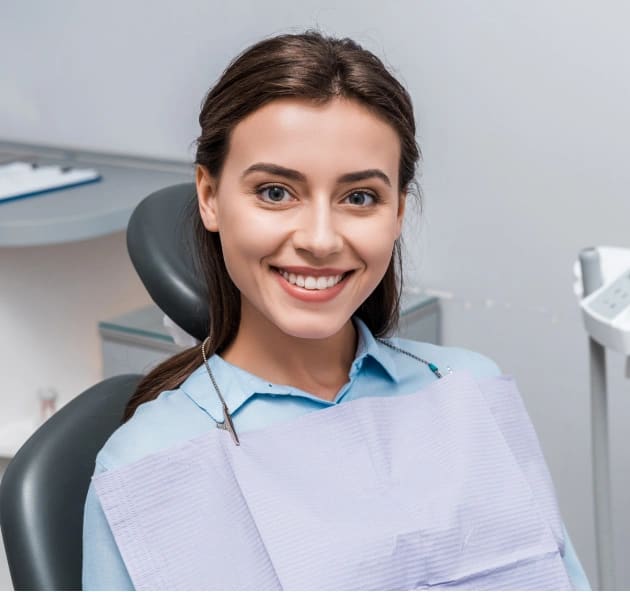 Patient smiling after teeth whitening at Warwick Dental, Oklahoma City