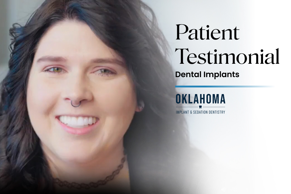 Smiling woman with septum piercing sharing a patient testimonial about dental implants at Warwick Dental in Oklahoma City.